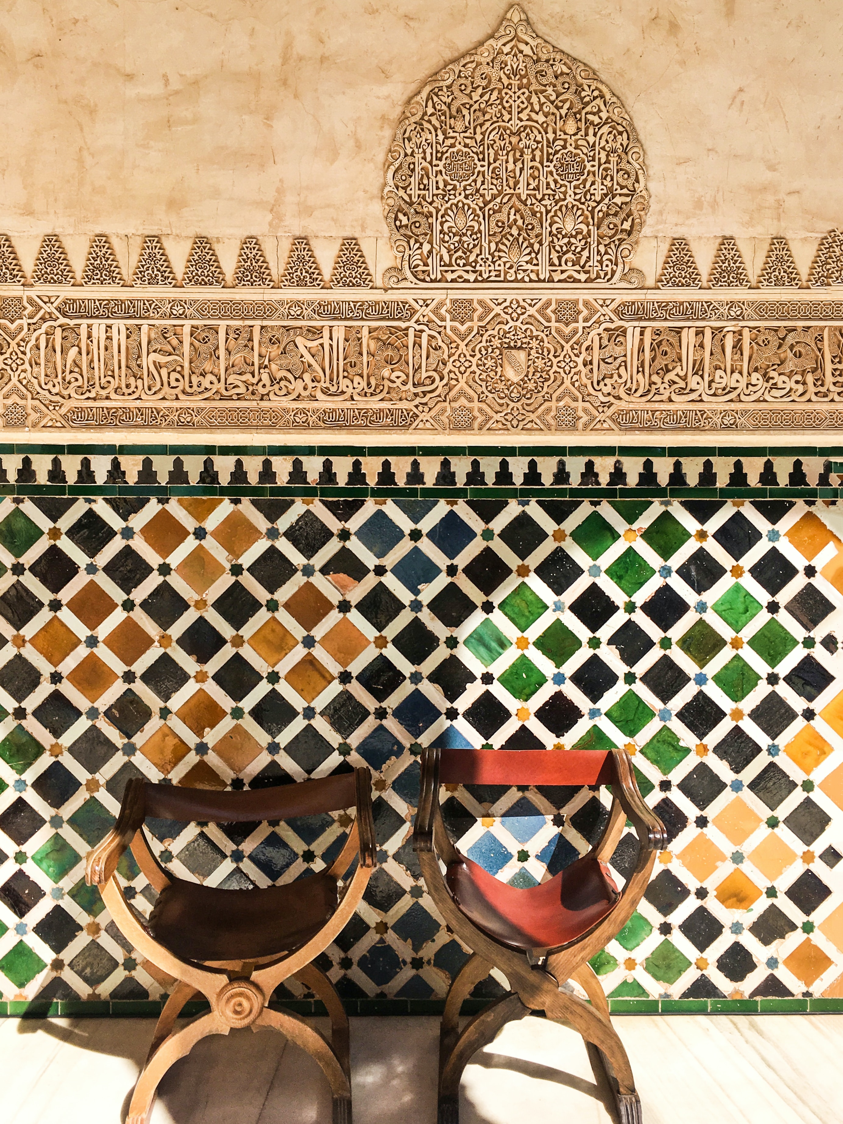 Patterned wall with chairs in Granada